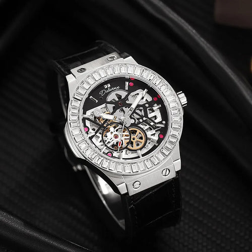 Men's automatic skeleton watch with diamond accents on dial, stainless steel case, leather strap.