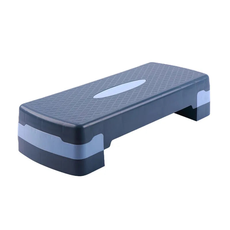 Grey Fit Step aerobics platform for fitness training on a floor.