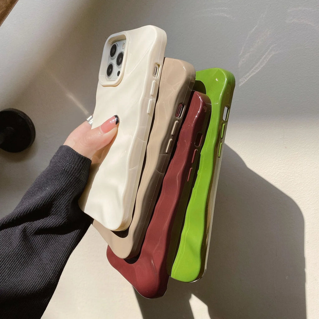 Soft solid colour wave pleated phone case for Apple iPhone 17 on a neutral background