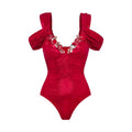 Women's floral swimsuit set with spaghetti straps, one-piece and two-piece options, in pink, red, blue, or gold.