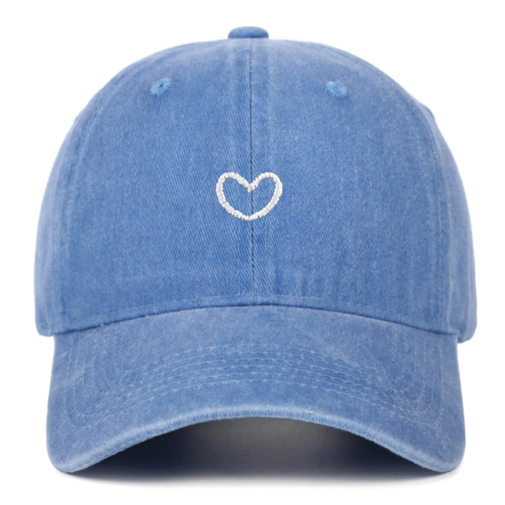 Adjustable cotton baseball cap in a retro style with embroidered detail on a dome crown.