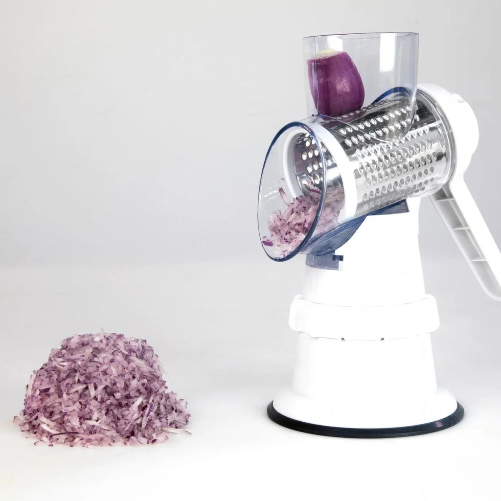 White plastic manual vegetable slicer with rotating drum and suction feet