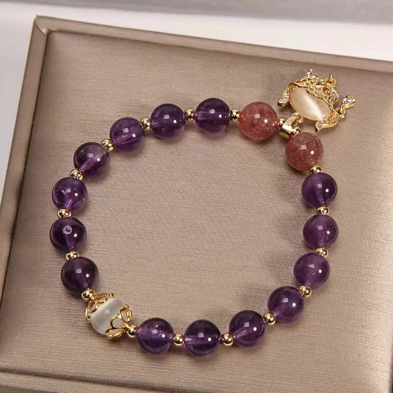 Women's copper bracelet with natural amethyst longevity lock charm and retro design elements