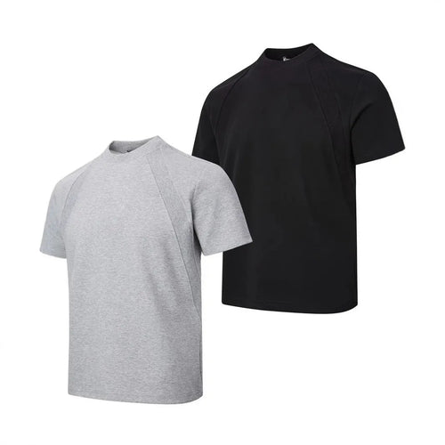Loose fit short sleeve polyester top in black, shown on a model