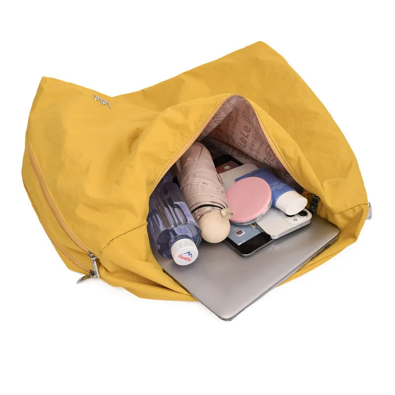 Heart-shaped nylon underarm bag for women in black, blue, khaki, or yellow colour options