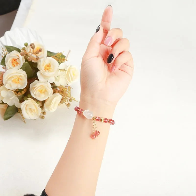 Strawberry quartz agate white rabbit bracelet with 6mm beads, geometric round design.