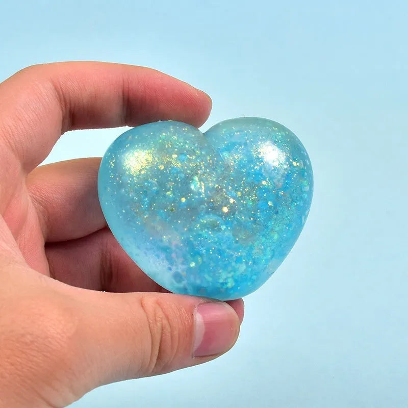 Malt sugar love squeezing toy vent ball in TPR, heart shape, 6 cm by 5.5 cm, random colour, for teens aged 7-14