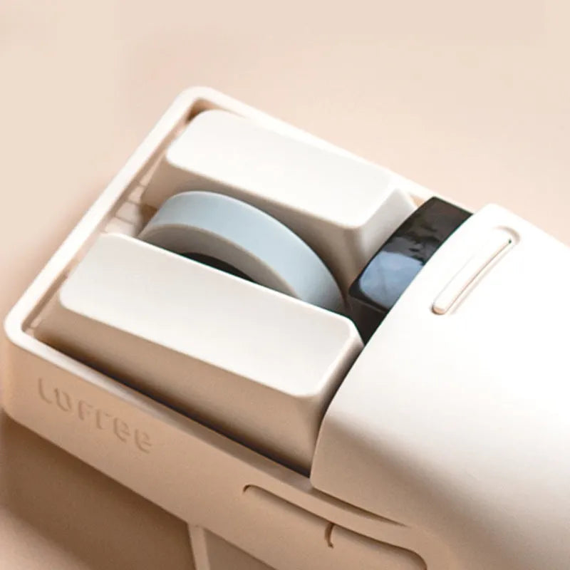 Xiaoqiao tofu-coloured wireless mouse with Type-C cable and USB receiver on a desk.
