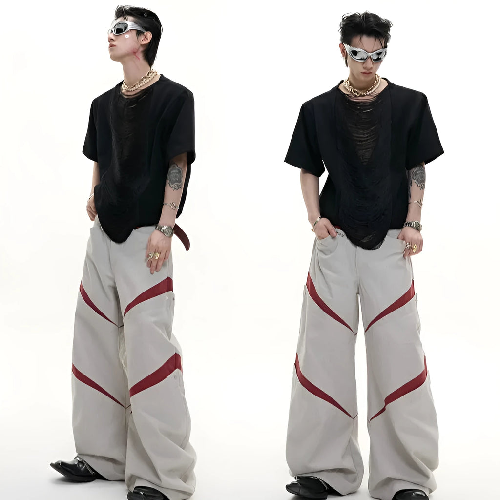 Men's black V-neck T-shirt with hollow out pattern and tassel detail