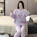 Women's warm loungewear outer wear suit in light purple with long sleeve pullover top and matching trousers