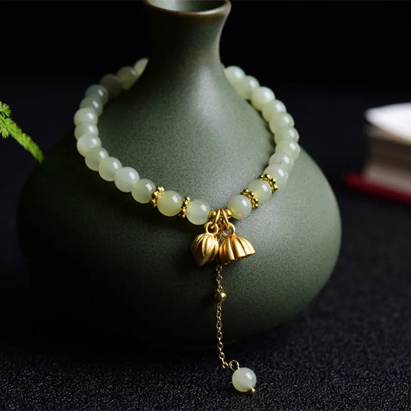 Natural Hetian Jade bracelet with lotus design and sunny water patterns