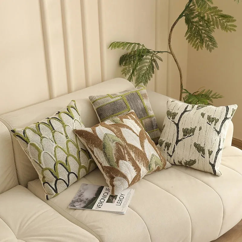 45cm square jacquard cushion cover with a retro plants and flowers pattern in various colours.
