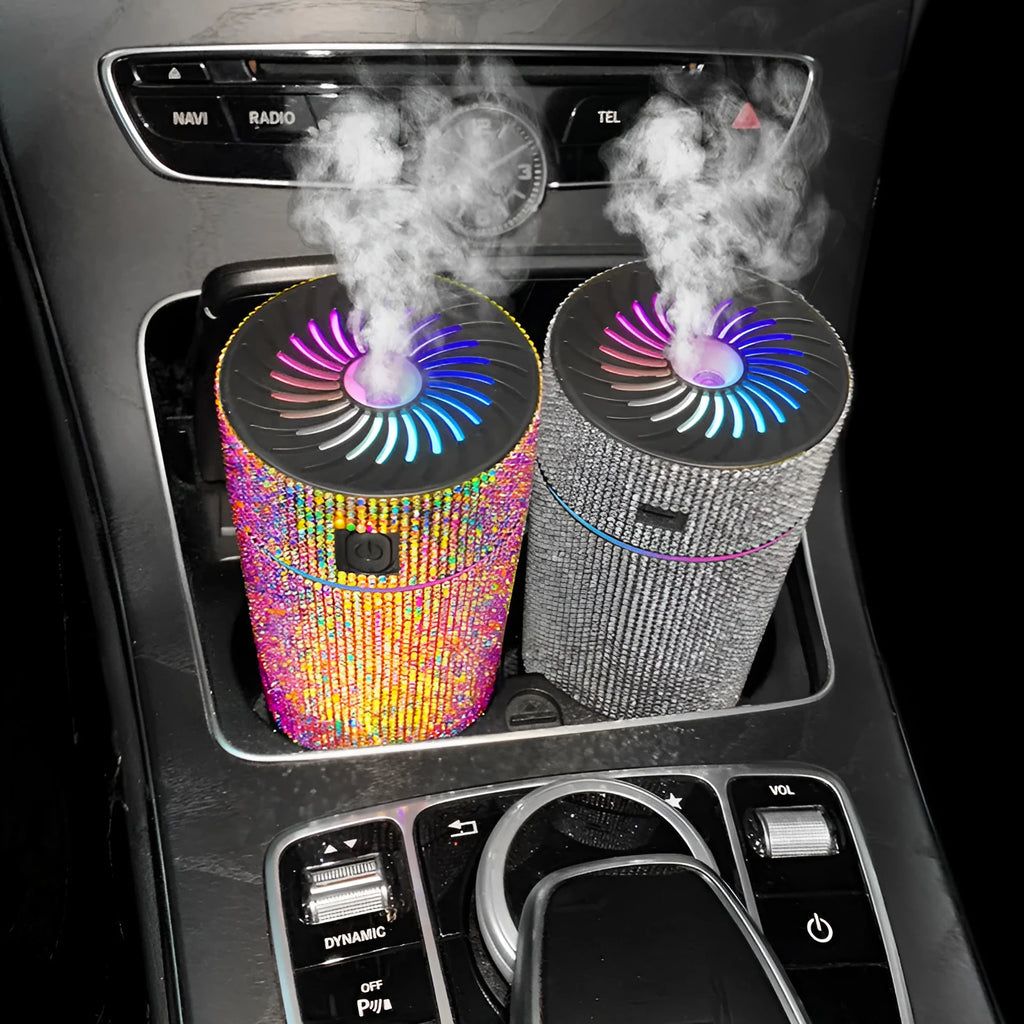 Compact white car USB air humidifier on a car dashboard.