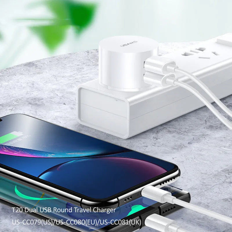 White portable universal dual USB phone charger with US, EU and UK plugs