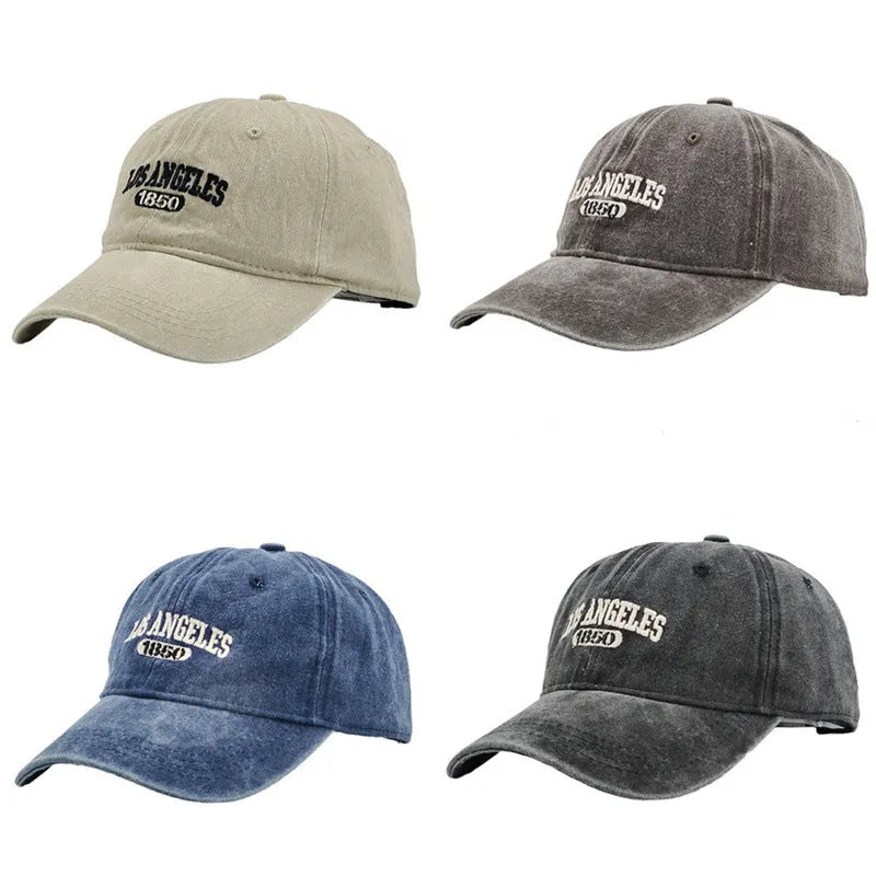 Retro personalised washed distressed peaked cap with adjustable strap and embroidered letters on the front.
