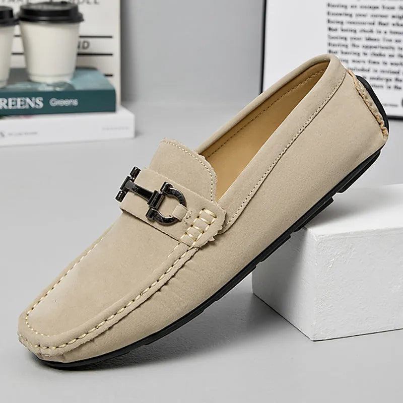 Men's beige leather casual loafers with a round toe and rubber sole.