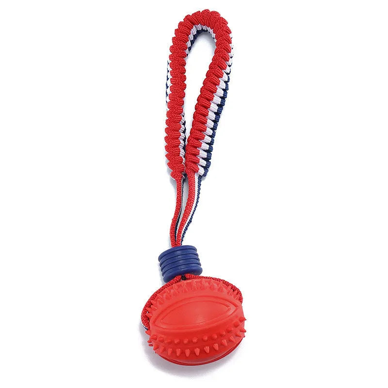 Blue natural rubber dog ball with rope toy, textured surface, shown with measurements