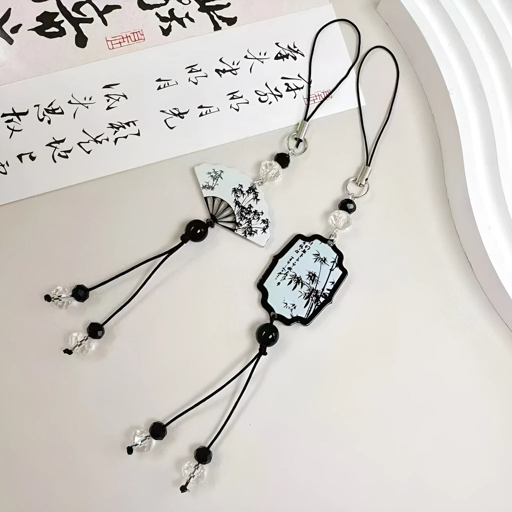 Guofeng Chinese-style floral bead keychain with metal ring on a coloured background.