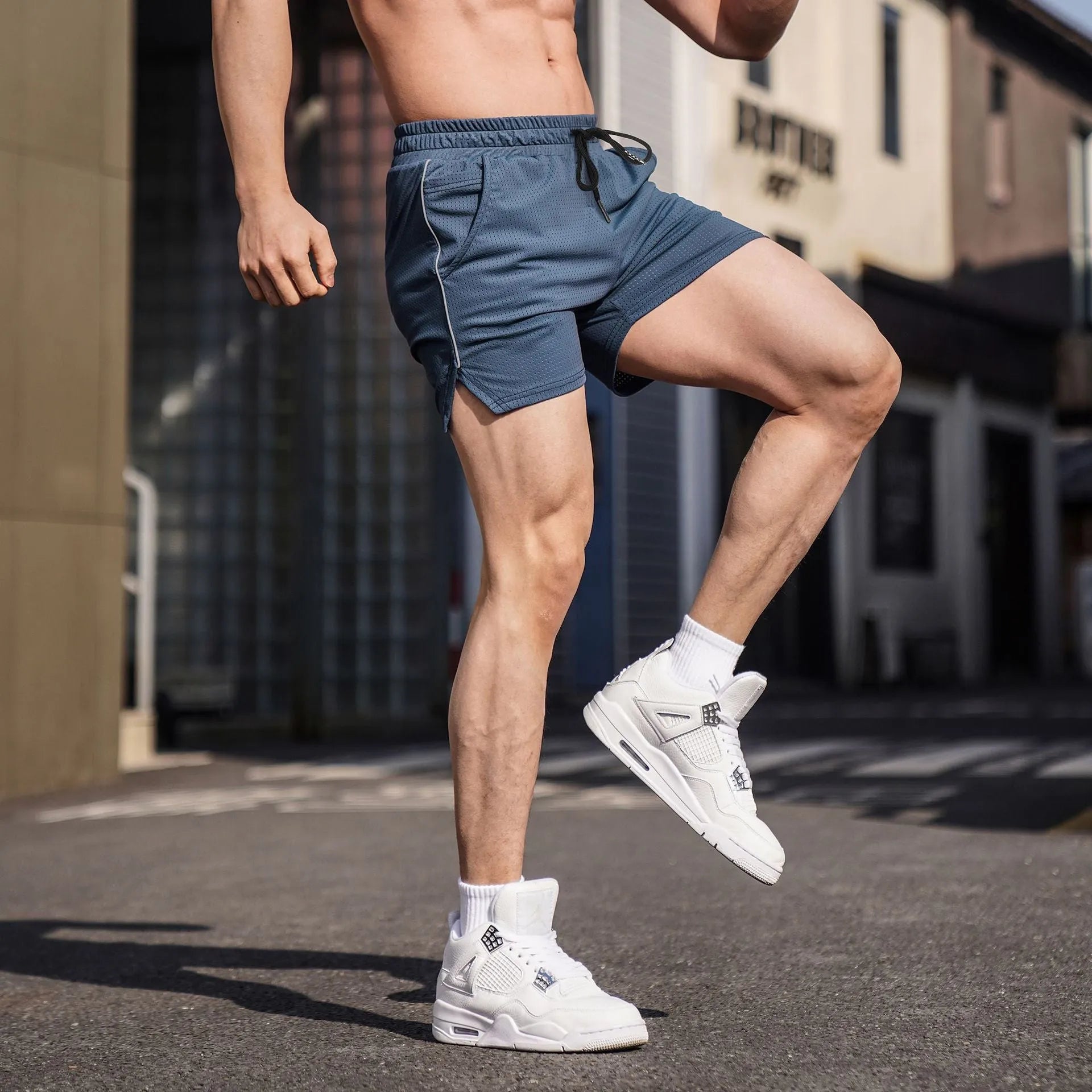 Men's fitness sports casual shorts in straight leg style with polyester fabric