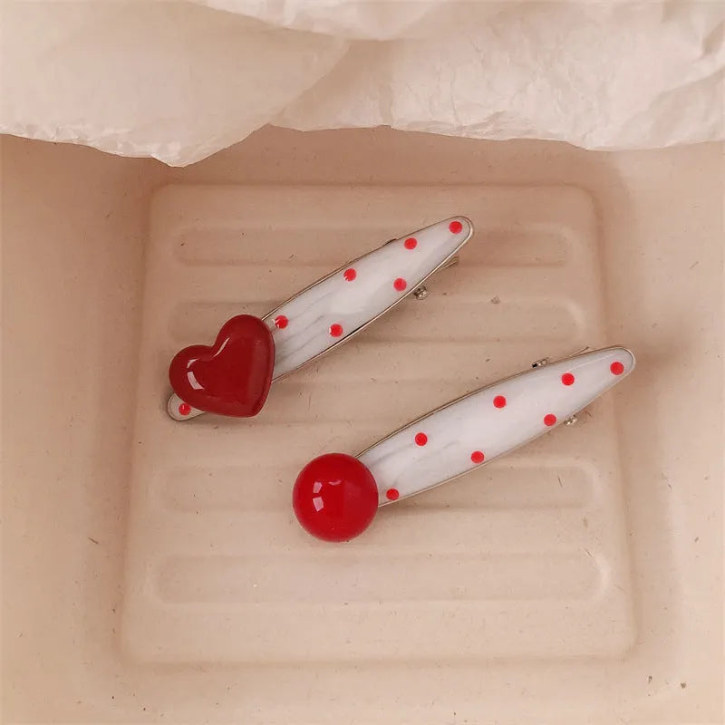 Red love heart shaped willow leaf hair clip with dots, a French retro Korean-style barrette.