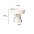 Raised ceramic cat bowl in animal theme design showing height and wide feeding surface