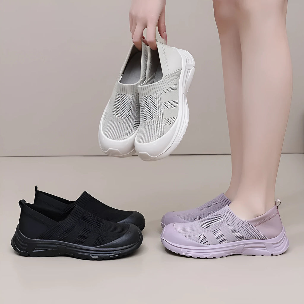 Women's slip-on casual shoes with cloth uppers and soft PVC soles in round toe design