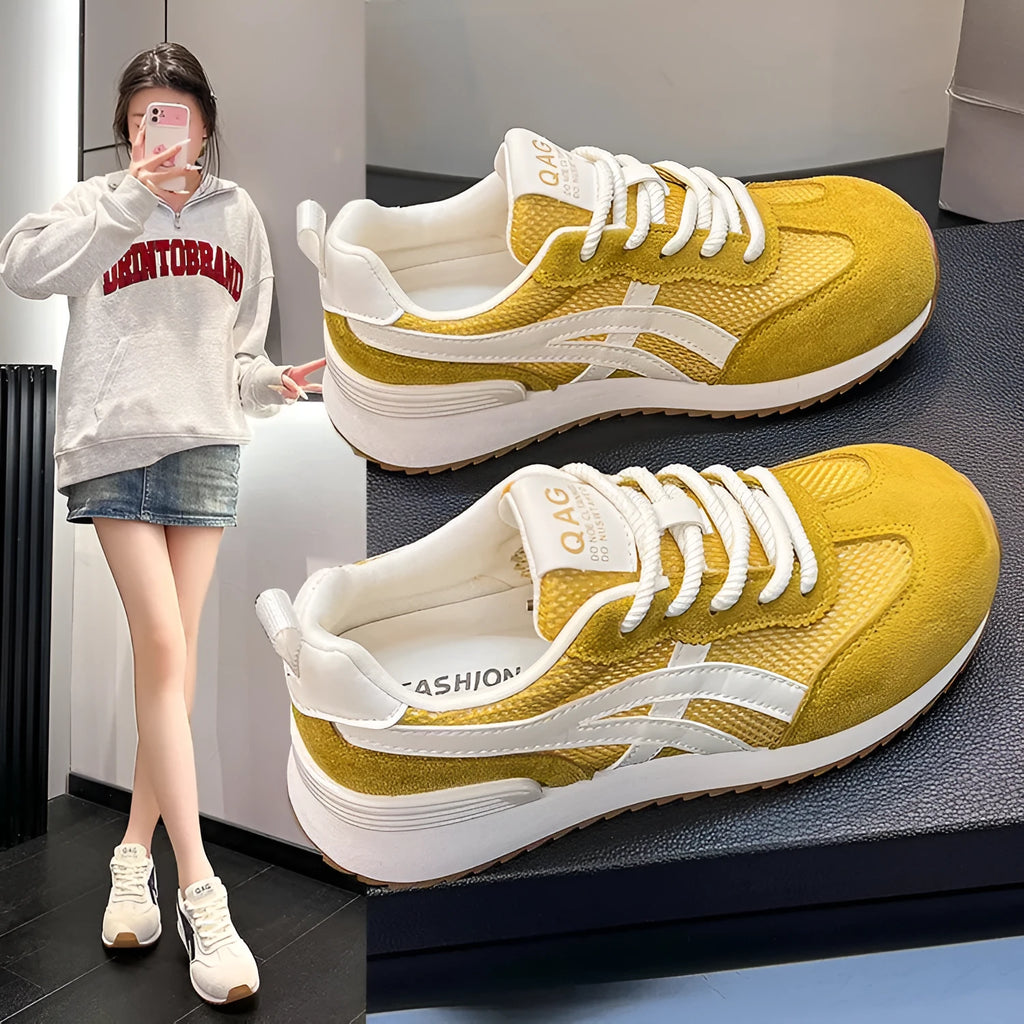 Women's white low-top lace-up sneakers with round toe and plastic sole