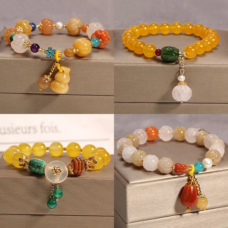 Yellow agate crystal bracelet on a gold silk cord, showing khaki colour and Japanese-Korean style.