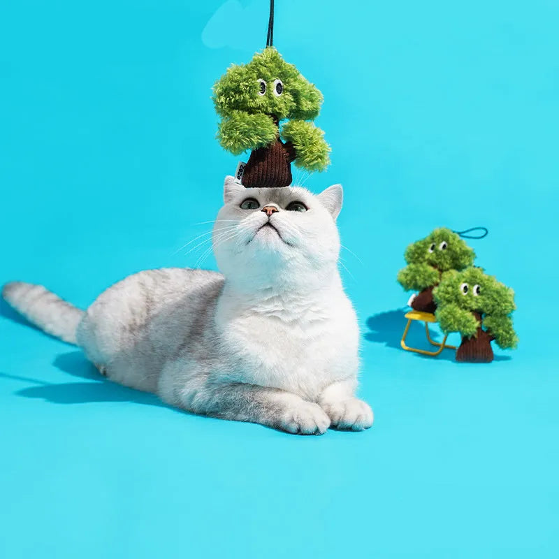 Cat toy with pine tree shaped catnip bag on teasing stick for interactive play