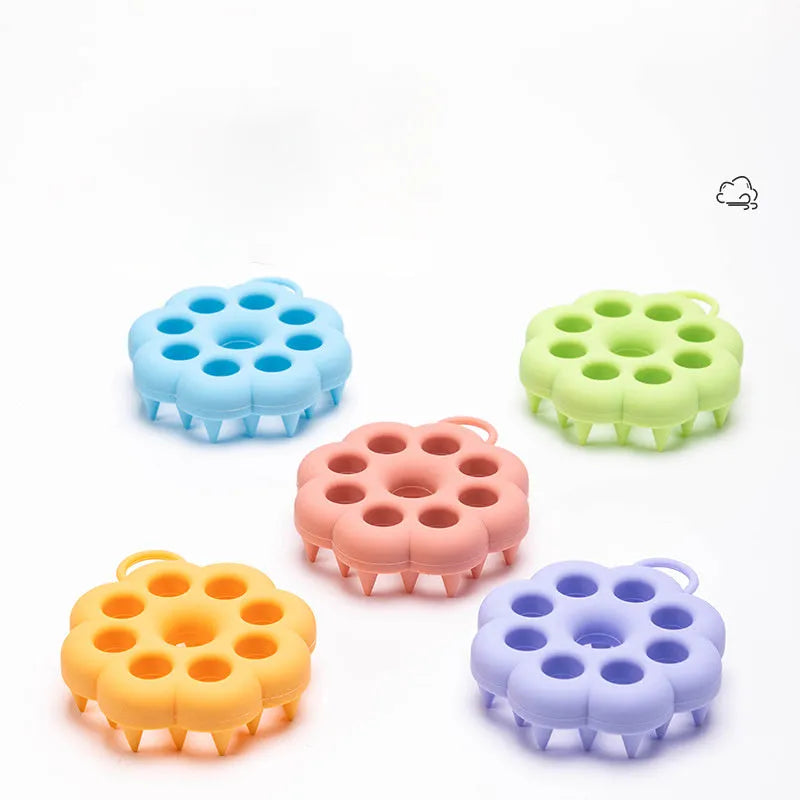 Silicone pet grooming brush with flexible pins and ergonomic handle in assorted colours