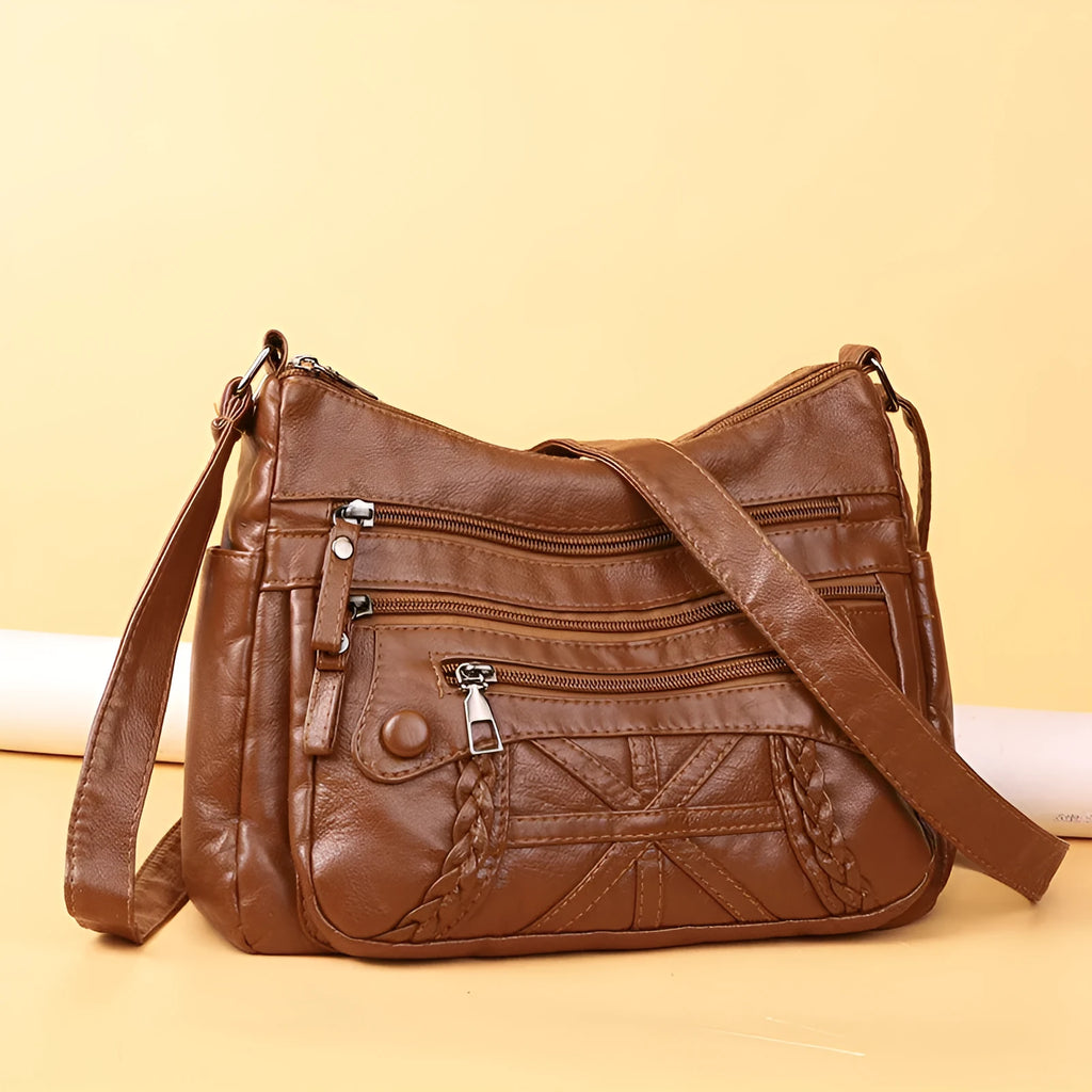 Soft PU casual messenger bag with multi-layer multi-pocket design in black colour