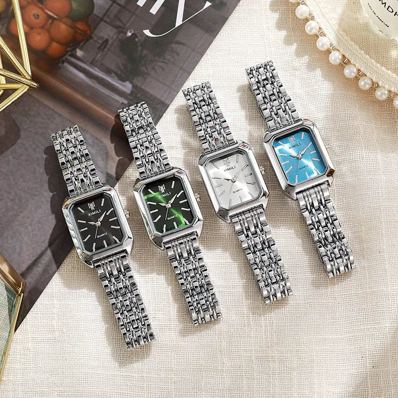 Simple square women's watch with alloy strap, quartz movement, and silver case on a white background