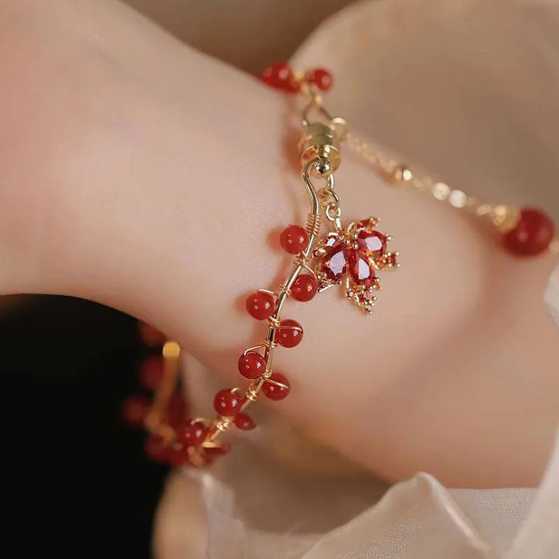Red ginkgo leaf magnetic bracelet with electroplated alloy finish and adjustable sizing