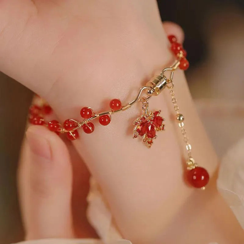 Red ginkgo leaf magnetic bracelet with electroplated alloy finish and adjustable sizing