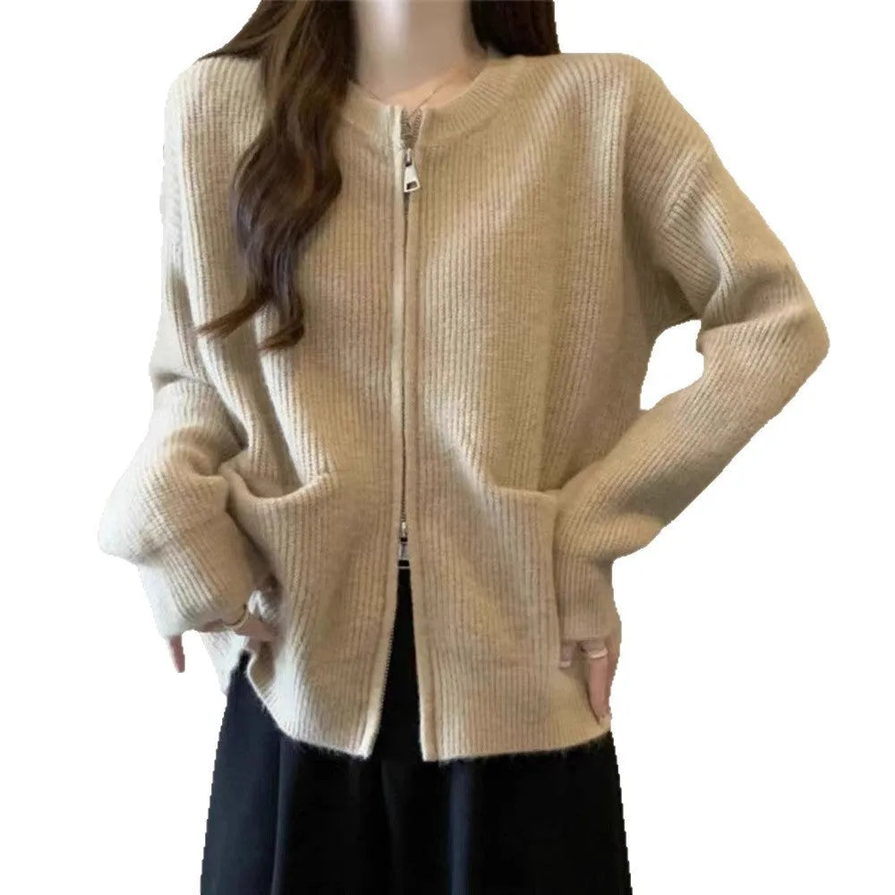 Beige women's long sleeve viscose cardigan sweater coat on a hanger