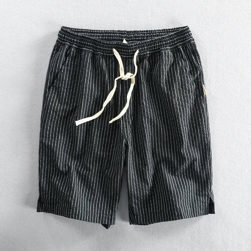 Men's striped loose-fit straight-leg casual shorts on a hanger.