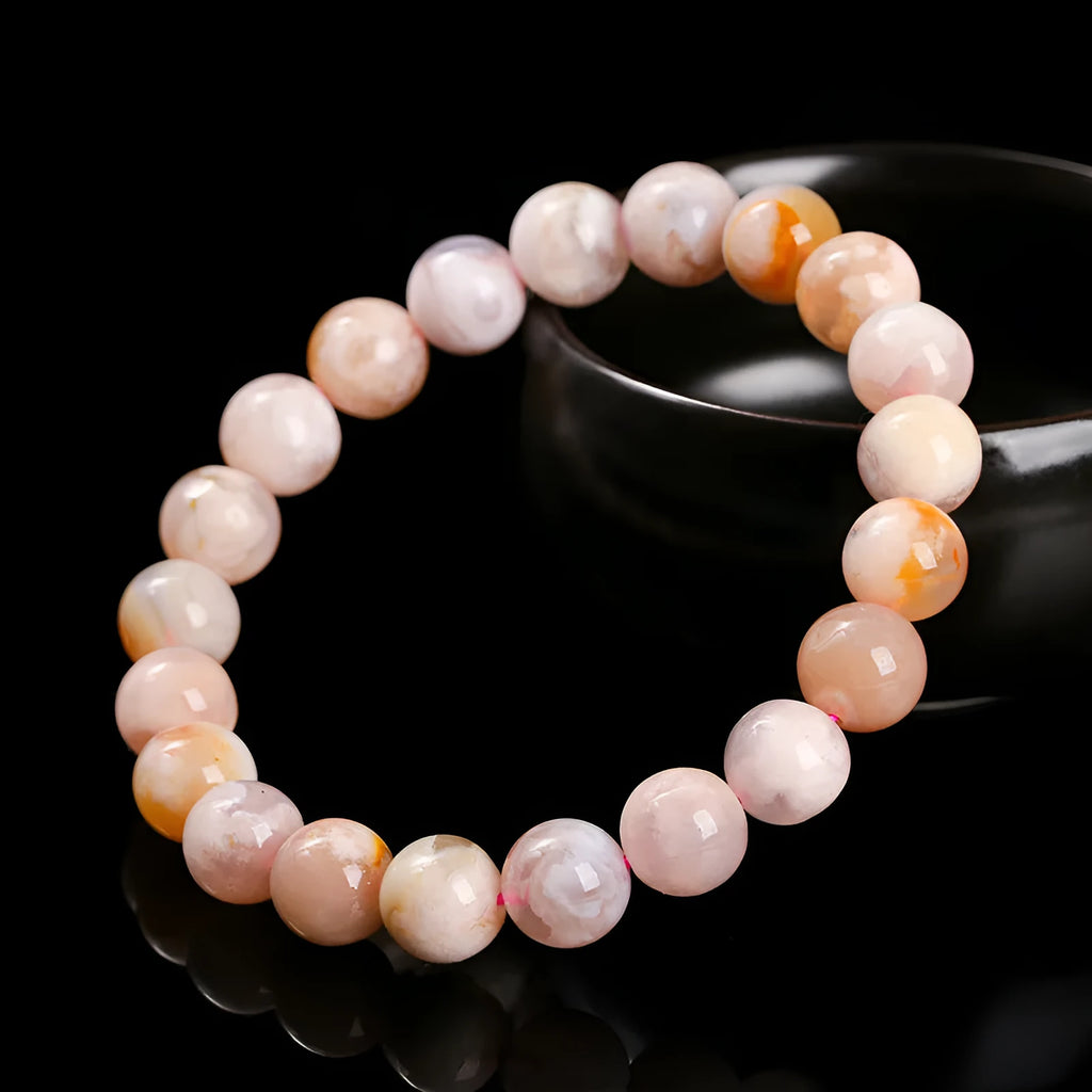 Natural cherry agate bracelet in 3A cherry blossom colour with geometric round shapes