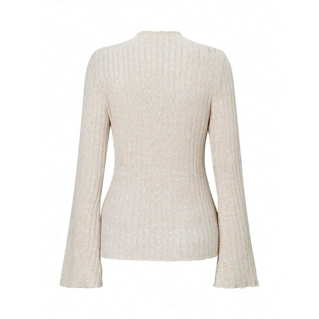 Black long sleeve slim fit top with round neck and lantern sleeves.