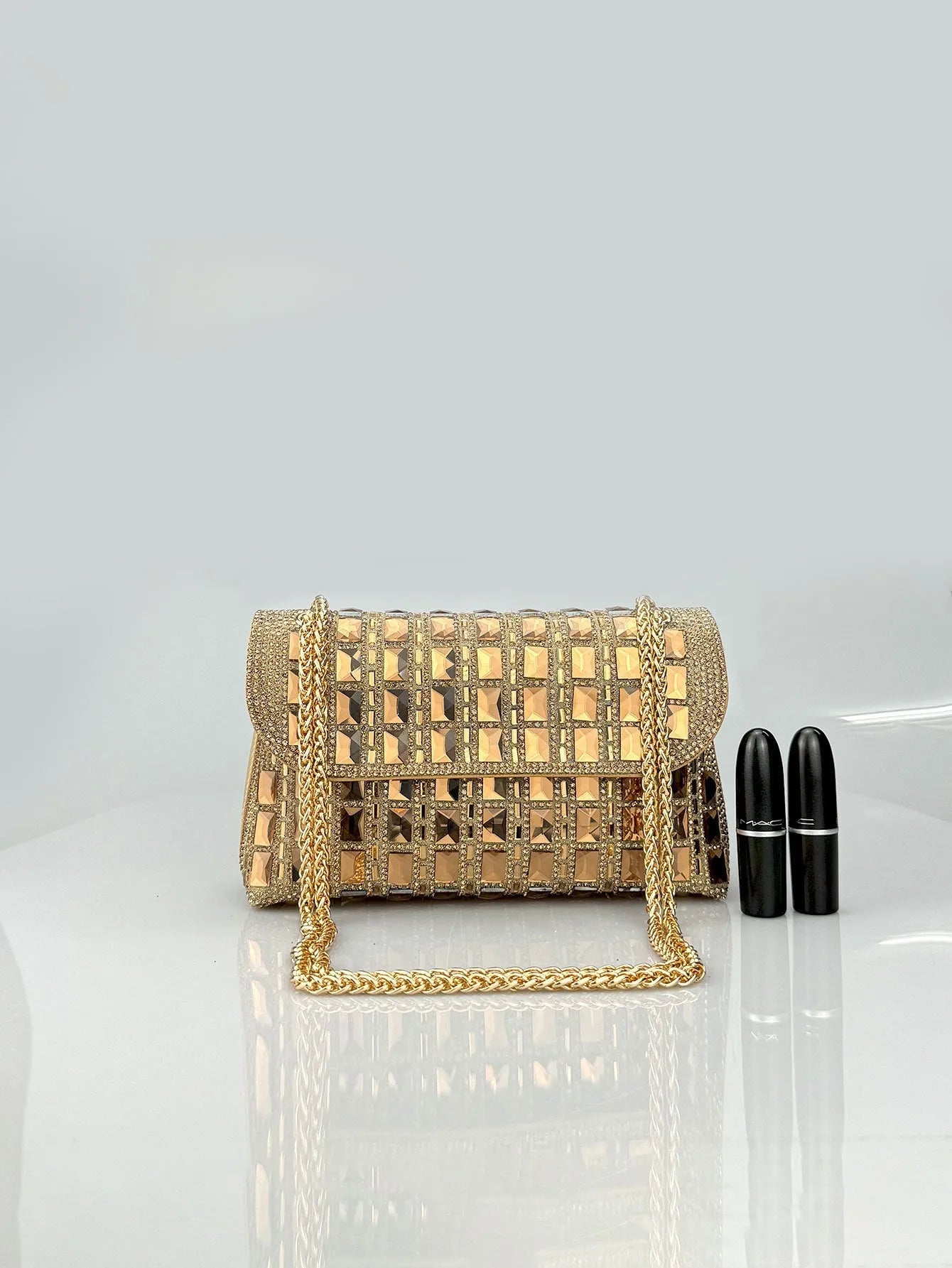 Glass rhinestone chain clutch handbag in horizontal square shape with retro styling and chain strap