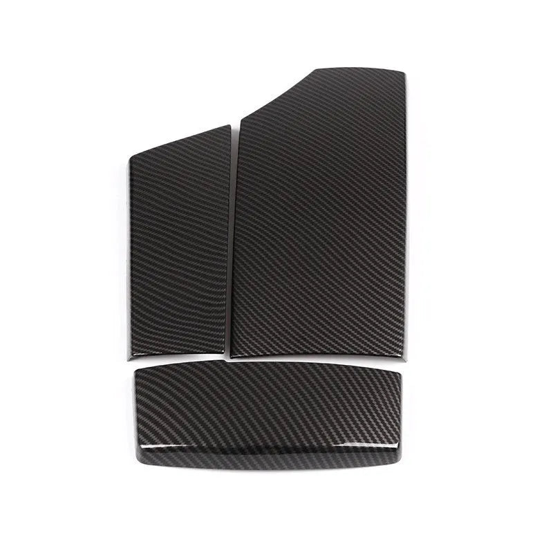 Three ABS carbon fibre pattern armrest box protective covers showing diagonal weave texture
