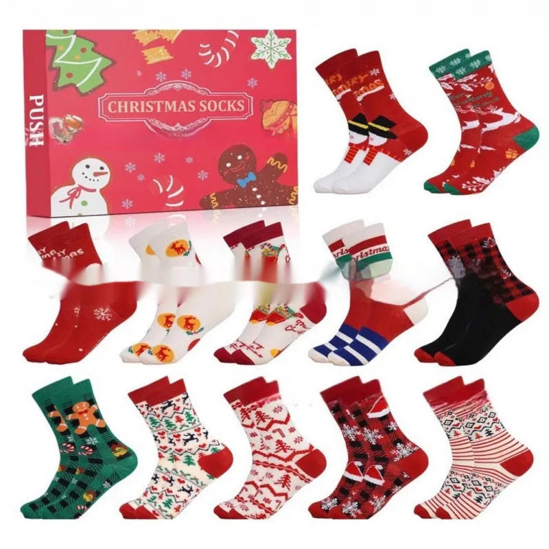 Set of seven colourful miniature Christmas sock ornaments from a blind box collection.
