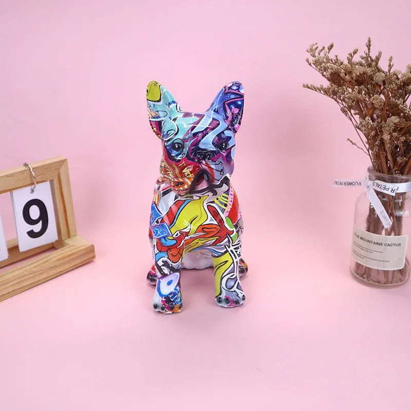 Graffiti-coloured resin French bulldog statue on a shelf