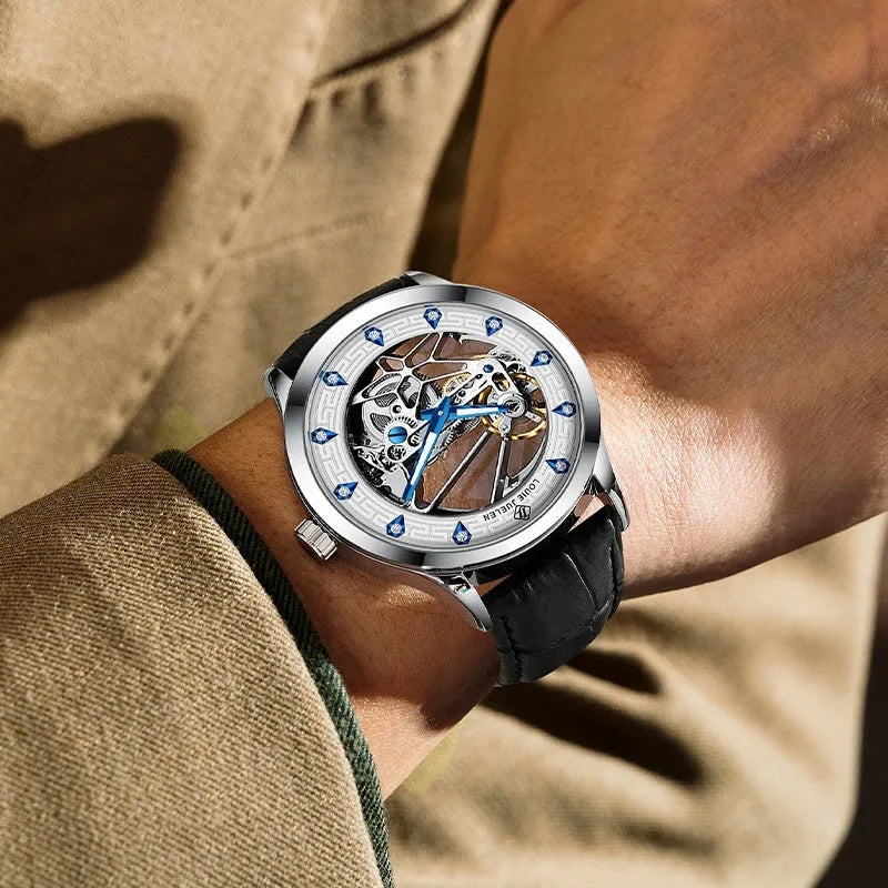 Men's silver case mechanical watch with white dial, blue hands, and a black genuine leather strap.