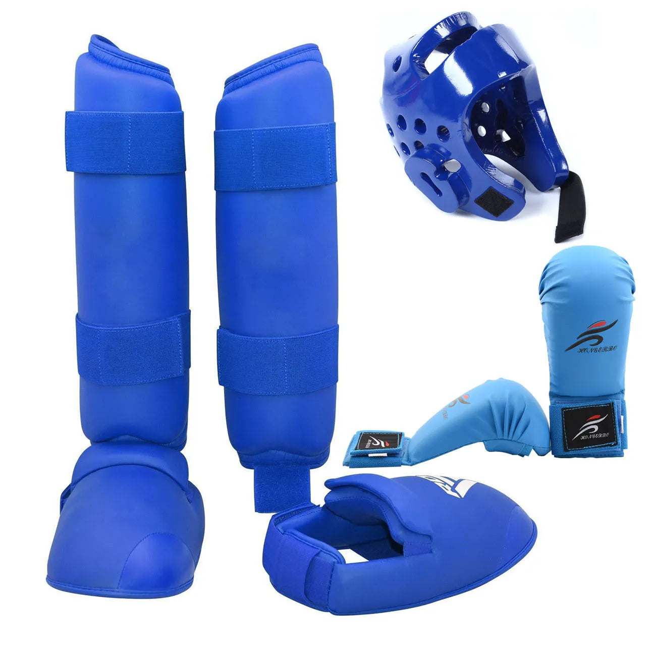 Red and blue karate protective gear set with helmet, boxing gloves and leg guards on training mat