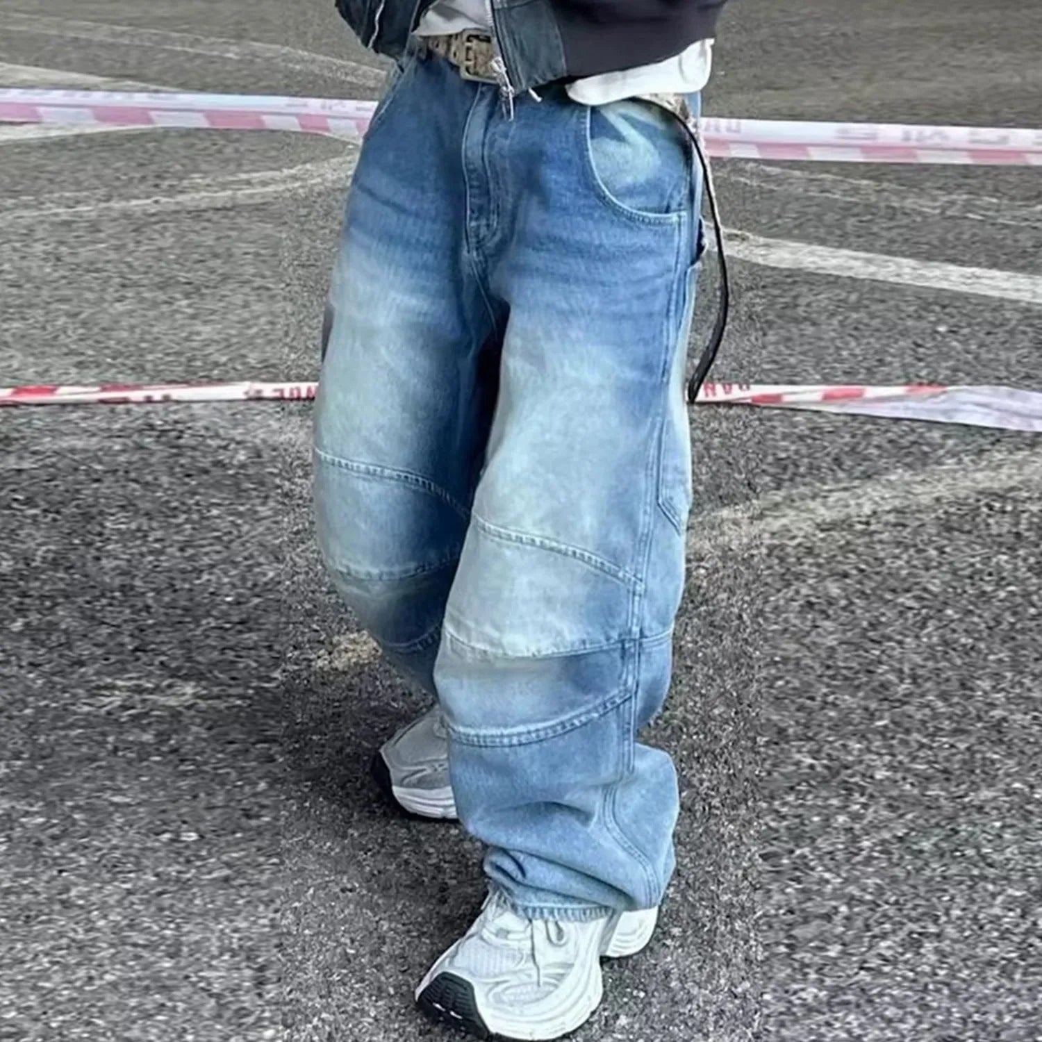 Men's washed white blue baggy jeans with pleated detailing and straight-leg style