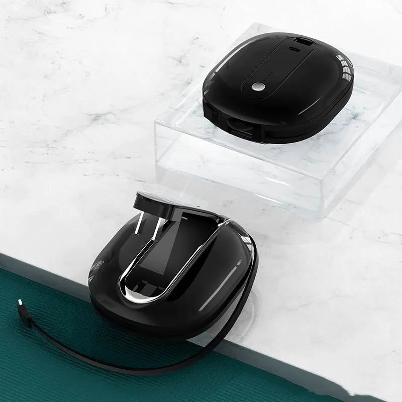Two-in-one 10000mAh power bank with integrated plug in black and white colour options