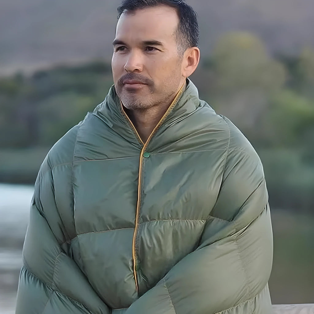 Army green outdoor portable down shawl camping blanket, 140 x 200cm, shown folded and worn over shoulders