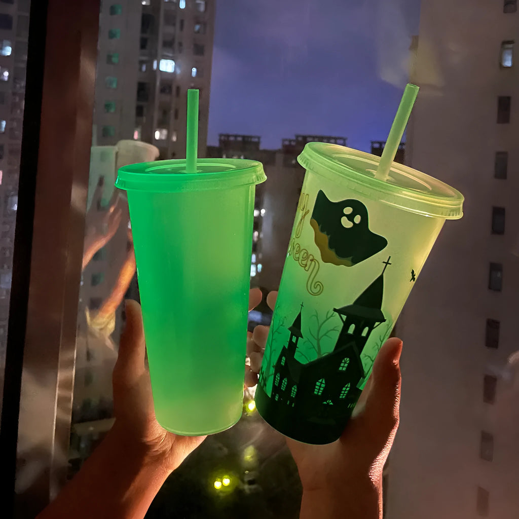 A tall, cylindrical 720ml Halloween-themed luminous plastic straw cup with a black straw, shown in one of six colour options.