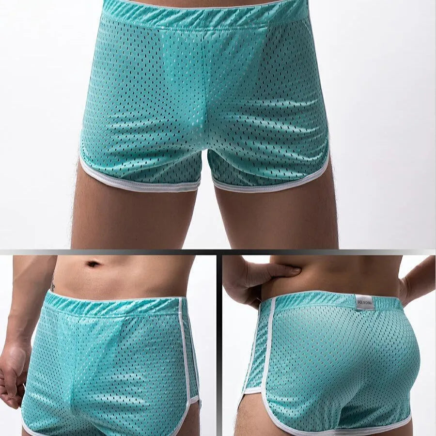 Men's solid-colour three-point boxer shorts laid flat, showing mid-waist band and three-point fly design.