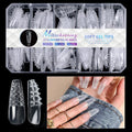 Long shaped false nail tips with an embossed 3D diamond pattern on the surface